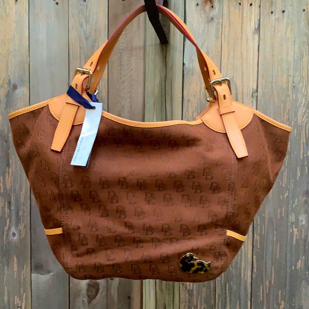 Dooney & Bourke “Medium Valerie” brown signature fabric purse with contrast trim